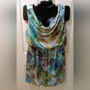 1X multicolor dress with gold belt.